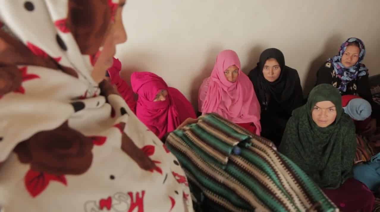 Uzra, who learned to read and write through Islamic Relief's education programme for women in Afghanistan, now employs nearly 50 local women in her handicraft business