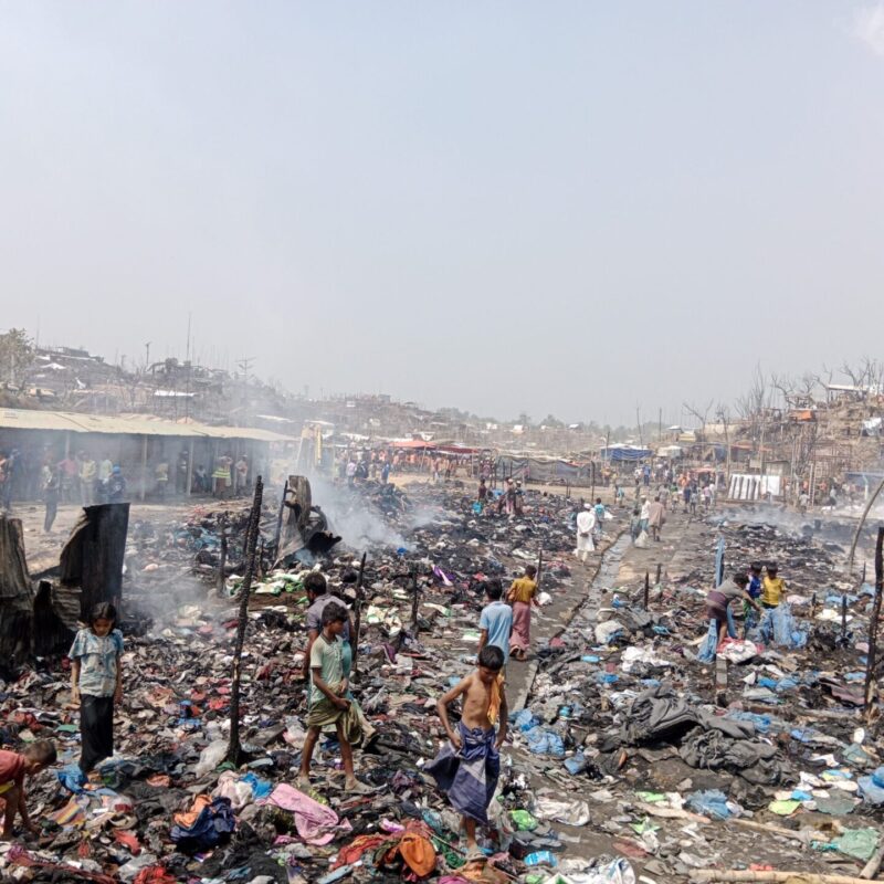 Massive fire broke out in Rohingya camps of Ukhiya sub district under Cox's Bazar on 5th of March. Fire originated in Camp 11 and soon spread to adjacent camps. Fire is a very common hazard in Cox's Bazar as the shelters are mostly made of bamboos and tarpaulin. Total of 2,000 shelters were completely burnt including mosques, hospitals and learning centres. Nearly 15,000 people are now without shelters.